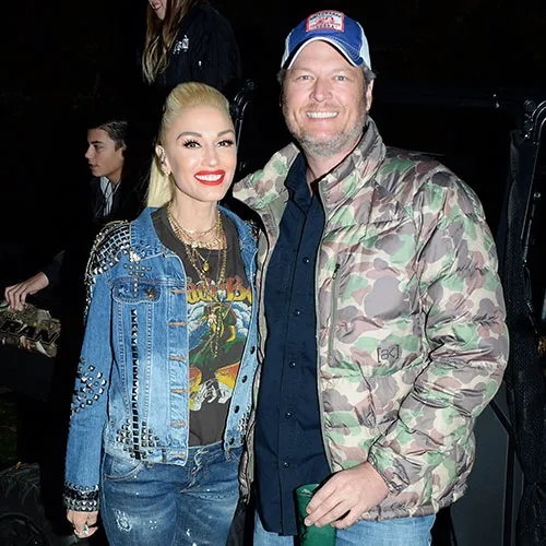 Gwen Stefani and Blake Shelton sharing a romantic moment.