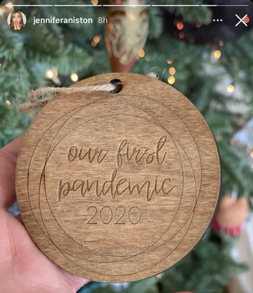 Jennifer Aniston decorating Christmas tree