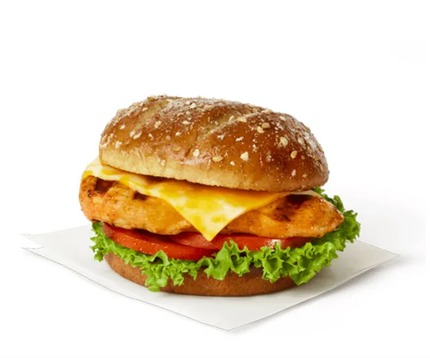 Grilled Spicy Deluxe sandwich with toppings.