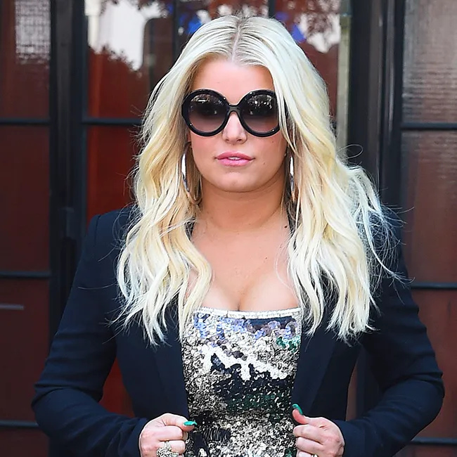 Jessica Simpson posing confidently for a promotional photo.