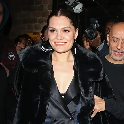 Jessie J at a glamorous event, highlighting her chic style.