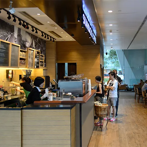 A selection of Starbucks beverages and pastries on display.
