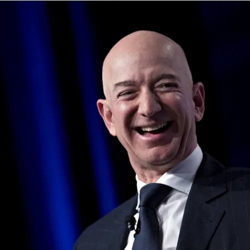Jeff Bezos smiling at a public event.