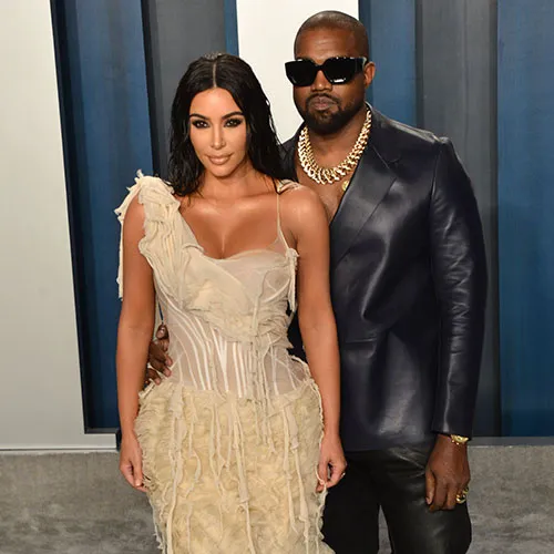"Kim Kardashian smiling at an event"