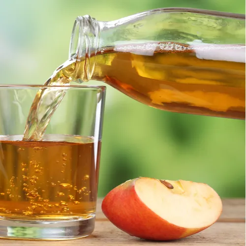 apple juice being poured