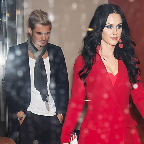 "Katy Perry and Orlando Bloom at an event"