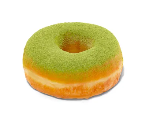 Delicious matcha donut with a vibrant green glaze.