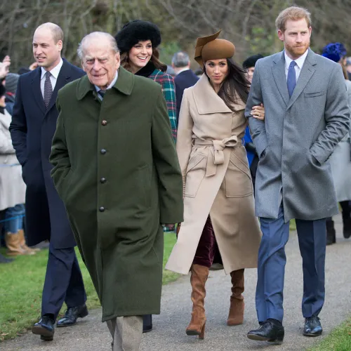 "Prince Philip with the Queen during a royal event"