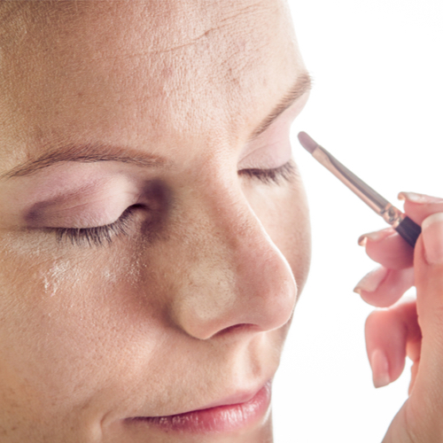 woman using eye primer