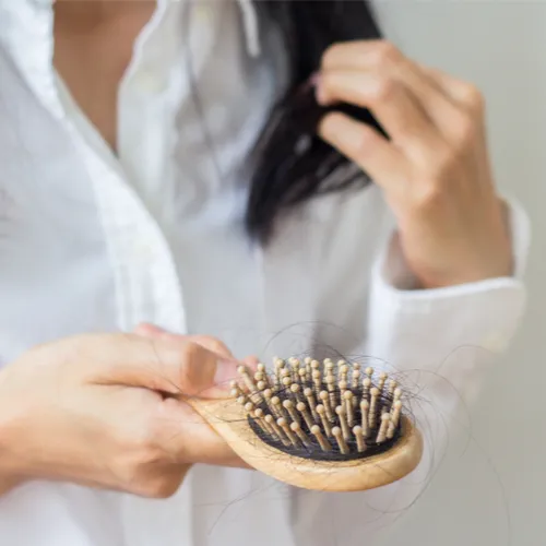 woman brushing hair