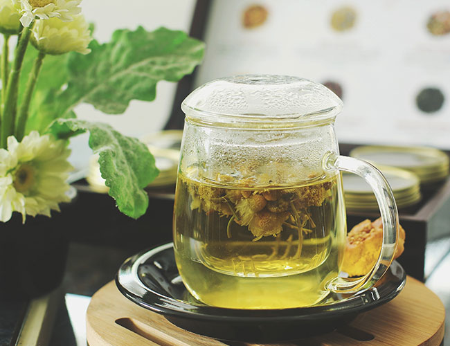 glass mug of green tea