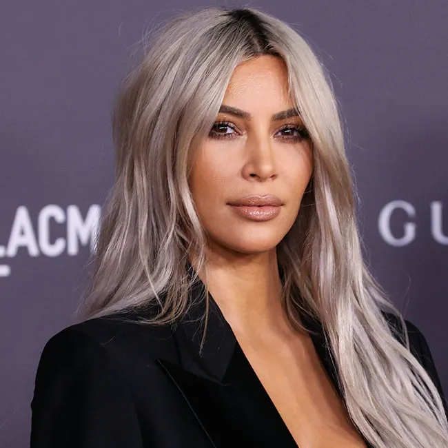 Kim Kardashian showcasing her stylish blonde hair.