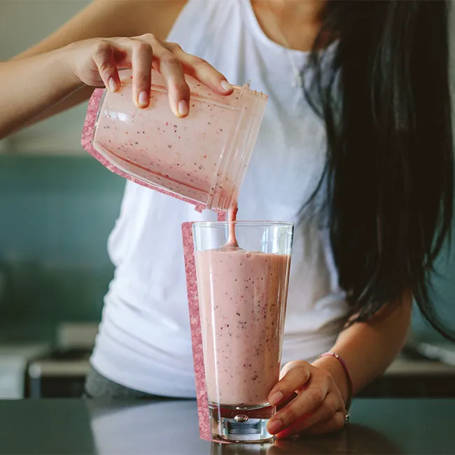 "Making a smoothie with fresh fruits"