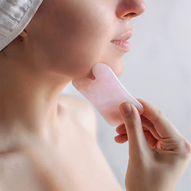 Gua sha tool for facial massage and skincare.