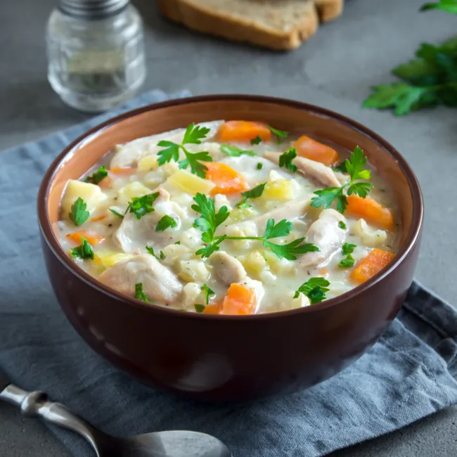 Creamy low-fat chicken stew with fresh herbs and spices