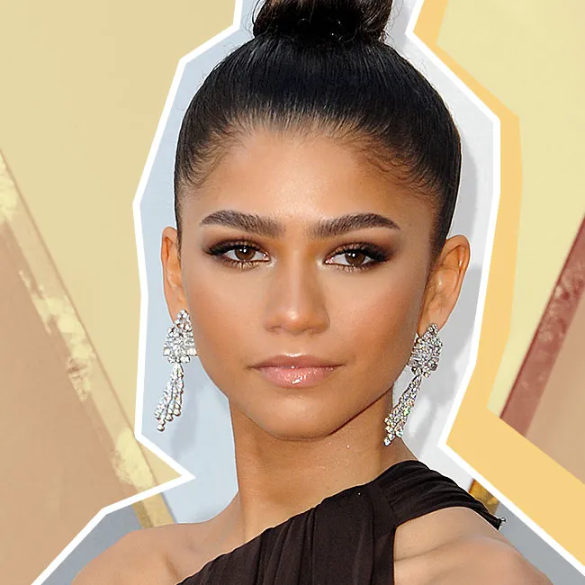 Zendaya in a stylish outfit at a premiere.