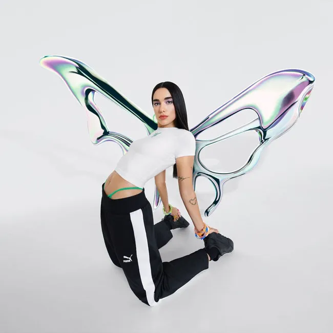 Dua Lipa showcasing Puma's latest athletic wear campaign.
