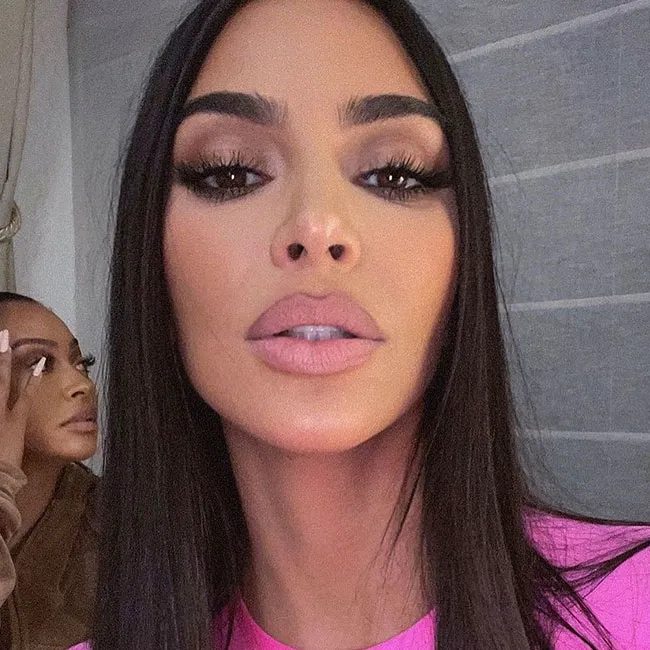 "Kim Kardashian in a high-cut bodysuit"