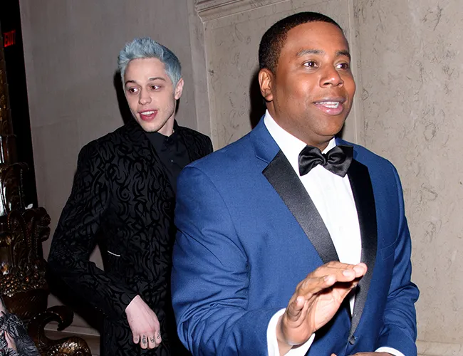 Pete Davidson and Kenan Thompson smiling together at a public event.