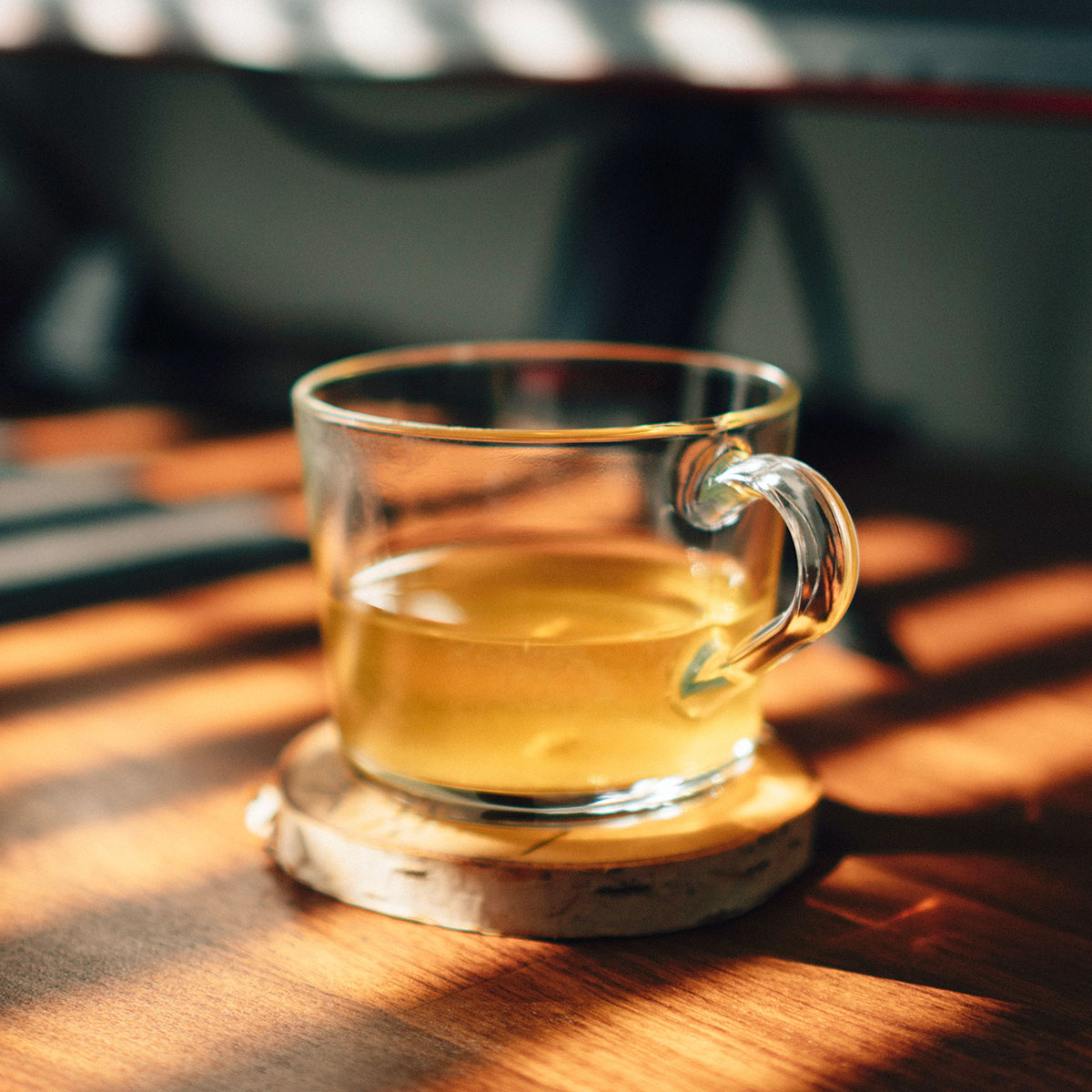 morning light green tea clear cup wooden table