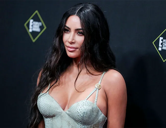 Kim Kardashian wearing a stunning Versace dress