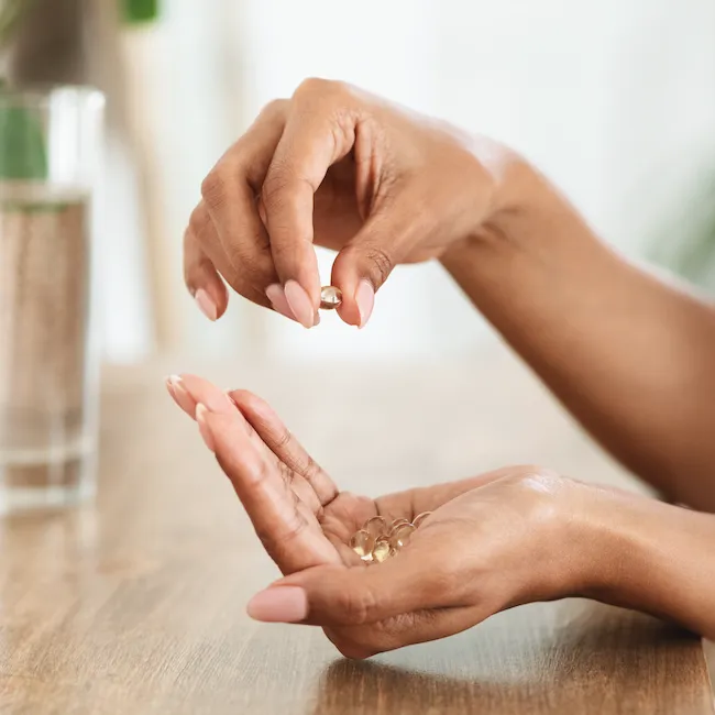 Woman applying skincare products