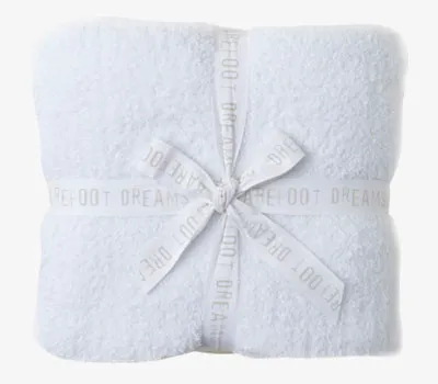 Barefoot Dreams CozyChic throw blanket for luxurious warmth and comfort.