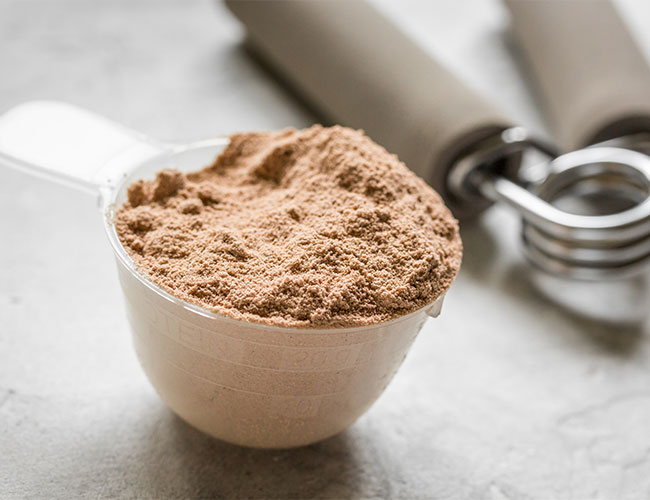 scoop of chocolate protein powder