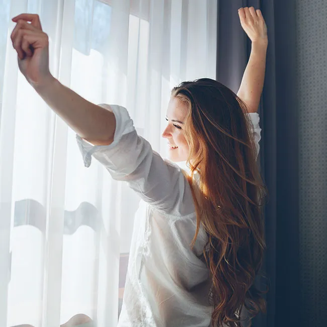 "Morning stretch by a sunny window"