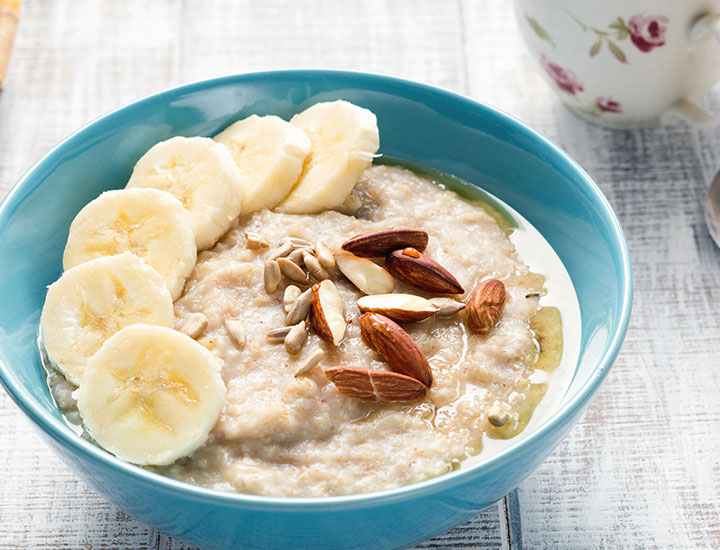 Oatmeal topped with fruit and nuts