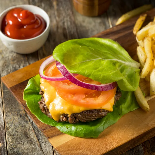 Delicious lettuce-wrapped burger with fresh ingredients