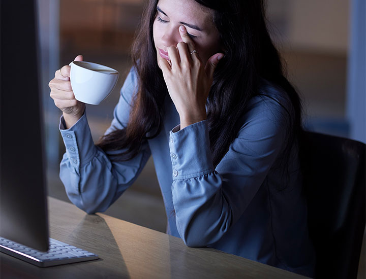 Woman staying up too late.