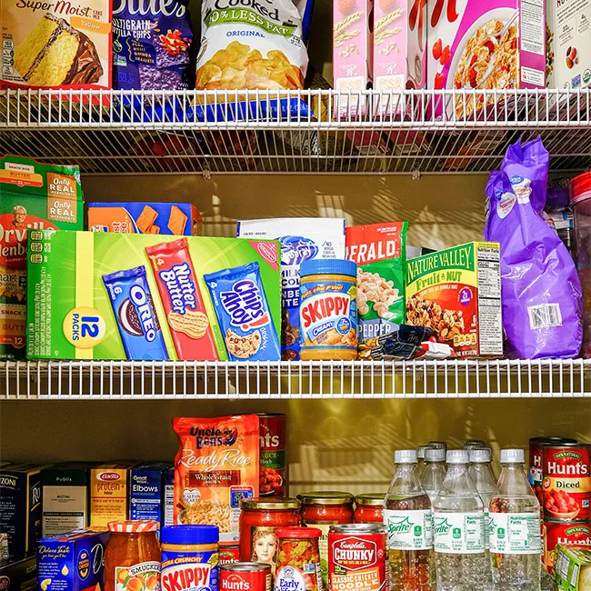 "Pantry filled with packaged snacks"