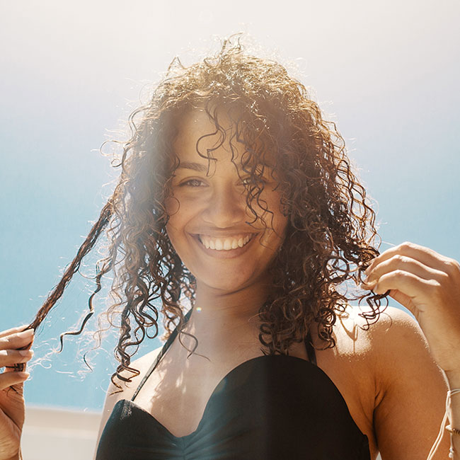 Can The Sun Damage Your Hair? We Asked Experts - SHEfinds