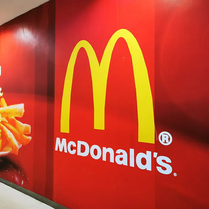 McDonald's signage highlighting the famous golden arches and menu items.