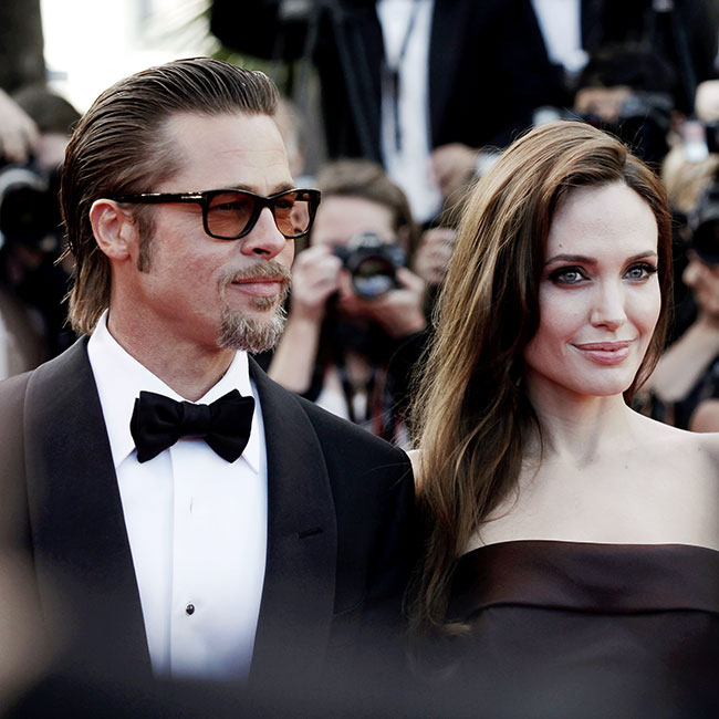 Brad Pitt suit and tie tuxedo Angelina Jolie brown strapless dress red carpet