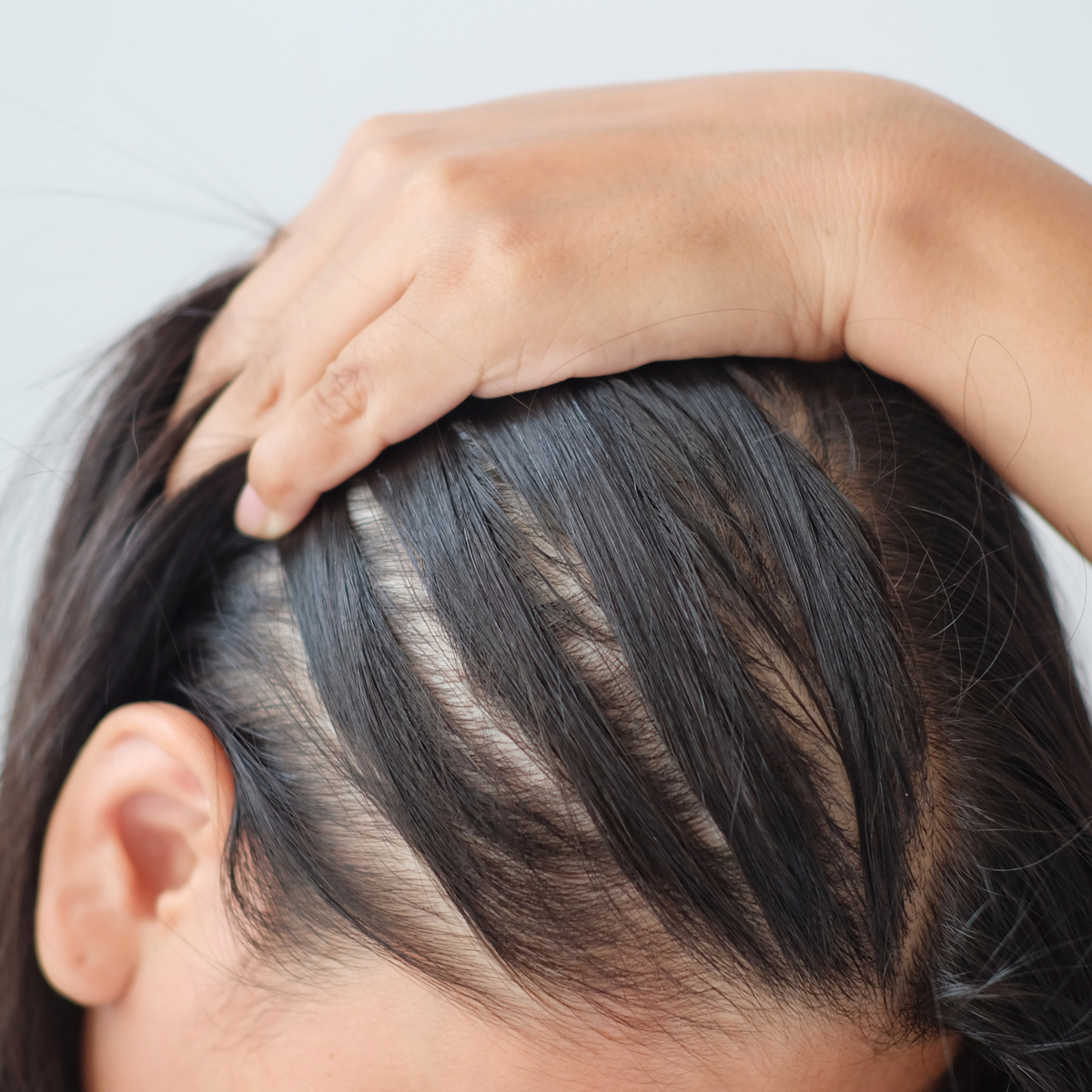 Hair Experts Tell Us How To Grow Thicker Hair - SHEfinds