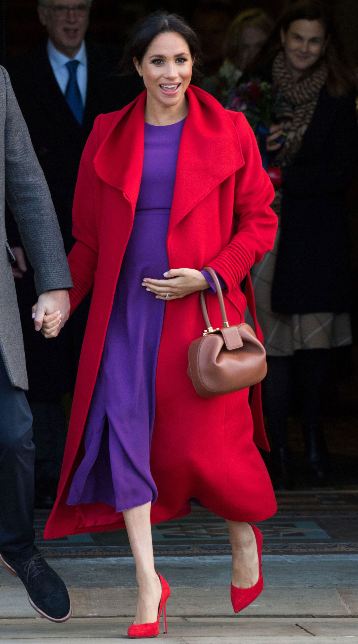meghan markle hamilton square birkenhead 2019 red coat purple dress