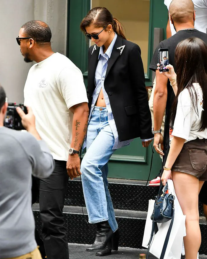 zendaya blue and white shirt blazer hair ponytail new york