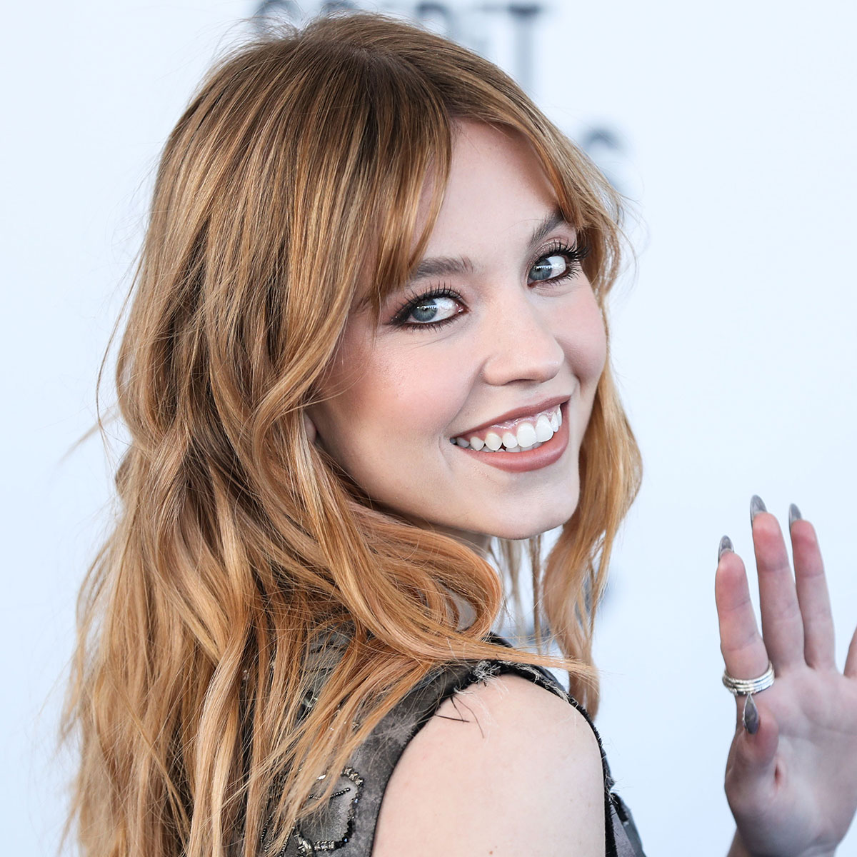 sydney sweeney red hair butterfly 90s cut red carpet
