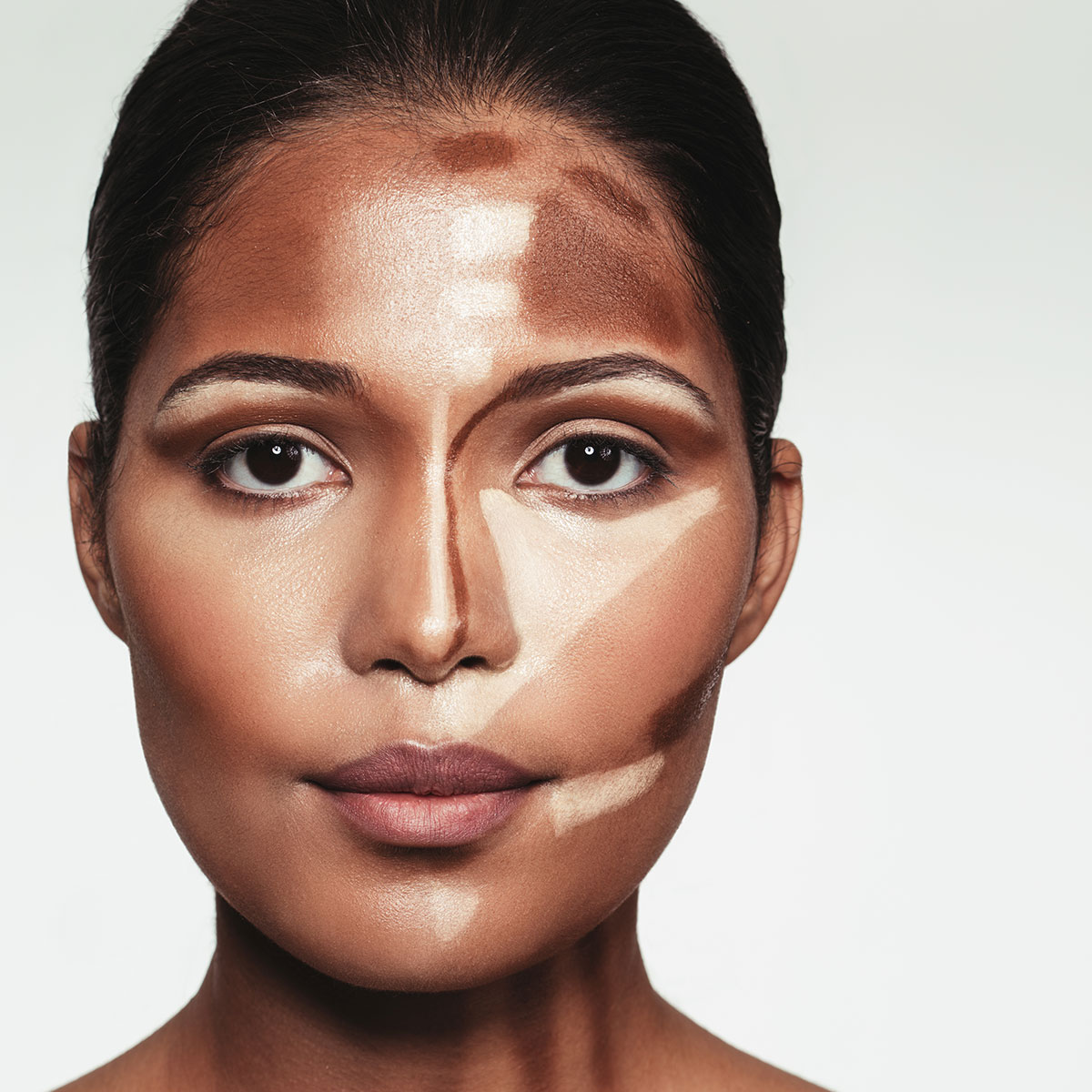 woman about to blend makeup for contour effect