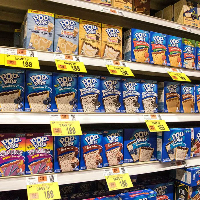 Colorful shelves stocked with various flavors of Pop-Tarts.