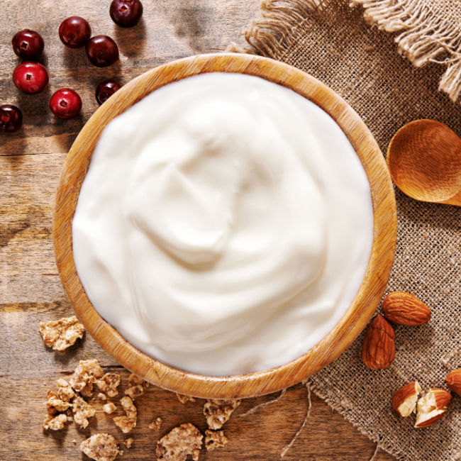 wooden bowl of yogurt