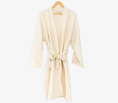 Soft Ettitude waffle bathrobe for relaxation at home.