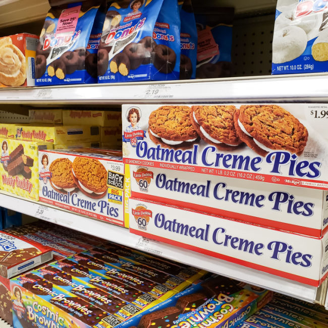 little Debbie has a snack at the grocery store