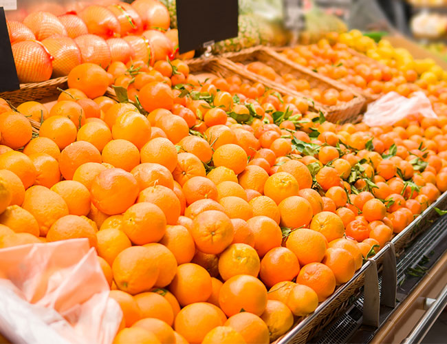 oranges on display at market