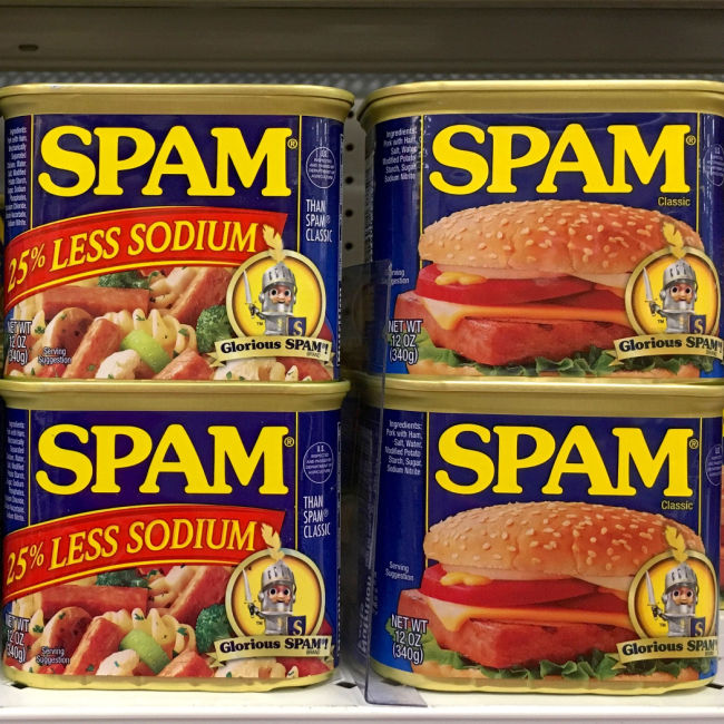 spam canned meat on supermarket shelves