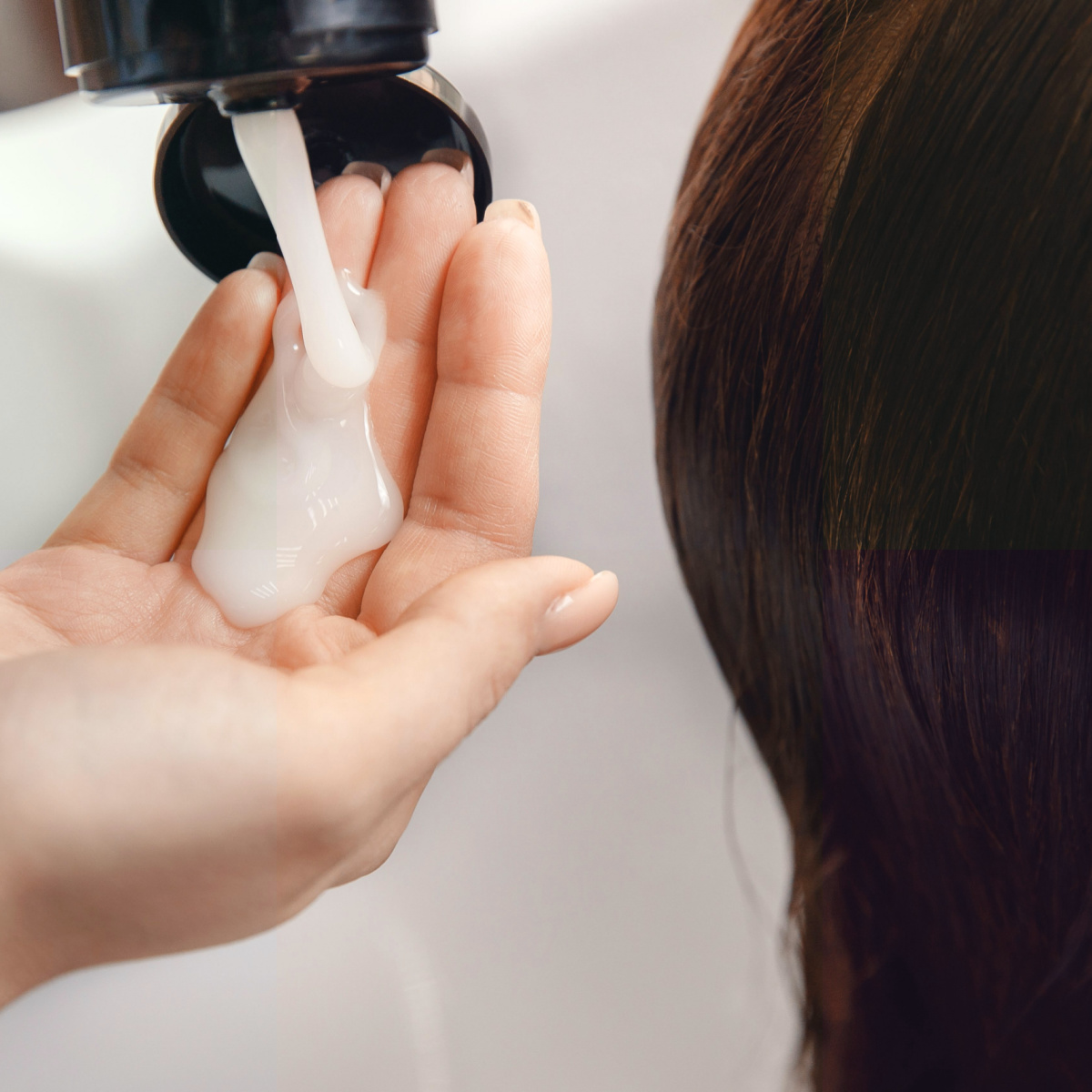 hair stylist about to apply shampoo to clients hair sink