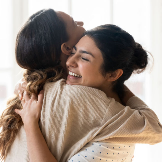 two women hugging