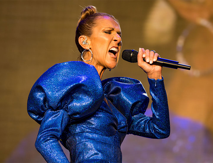 Celine Dion performing blue dress